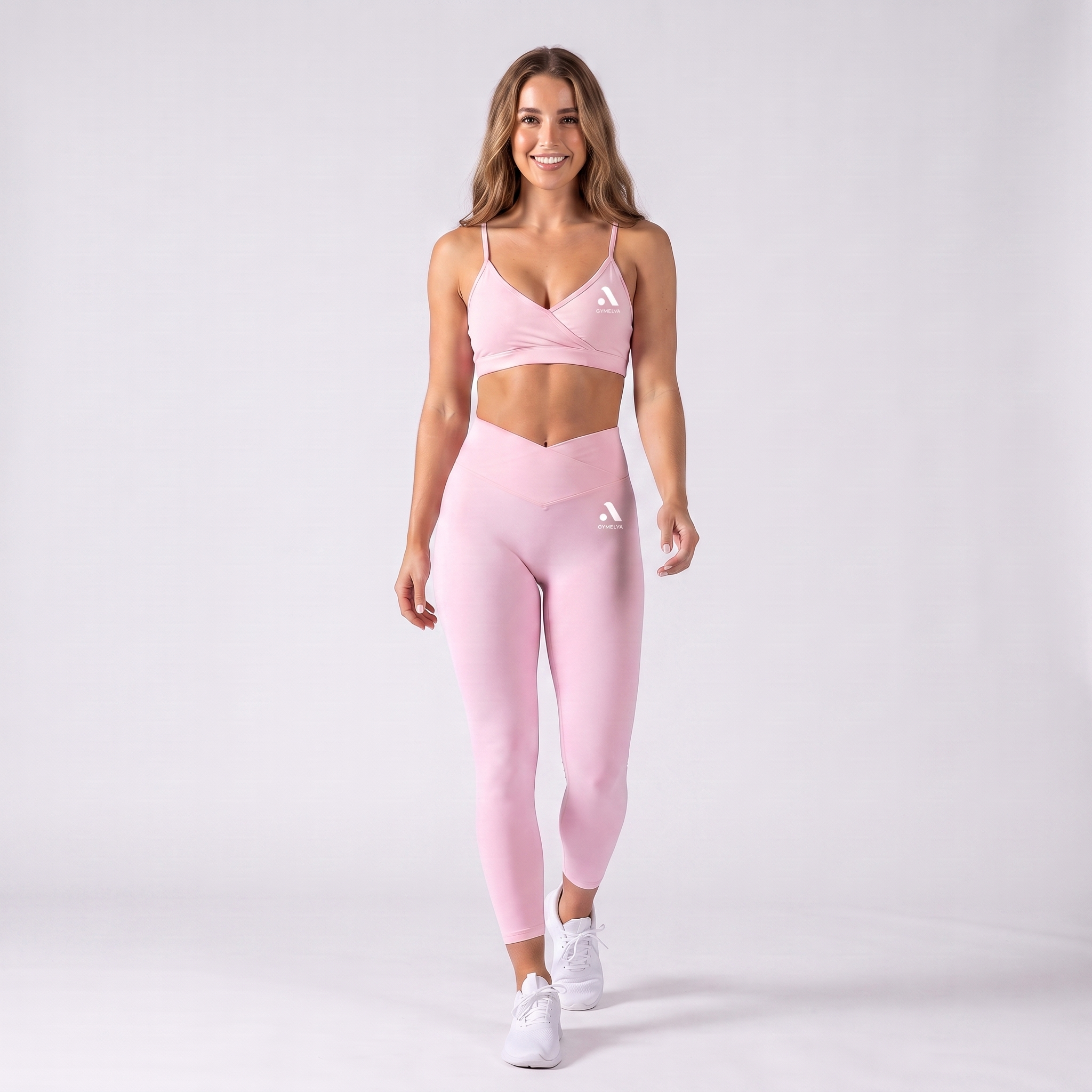 GYMELVA Élan Seamless Set Blush Pink - walking